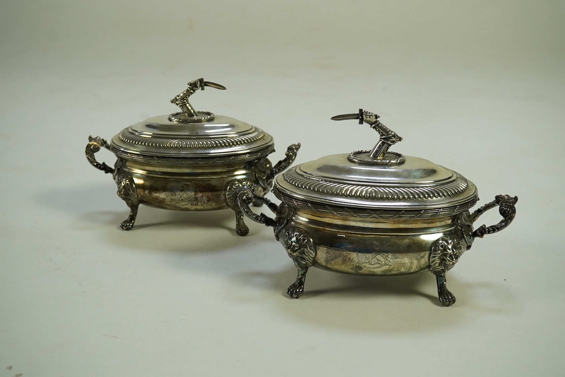 A pair of George III silver two handled oval sauce tureens and covers, by Robert Garrard I